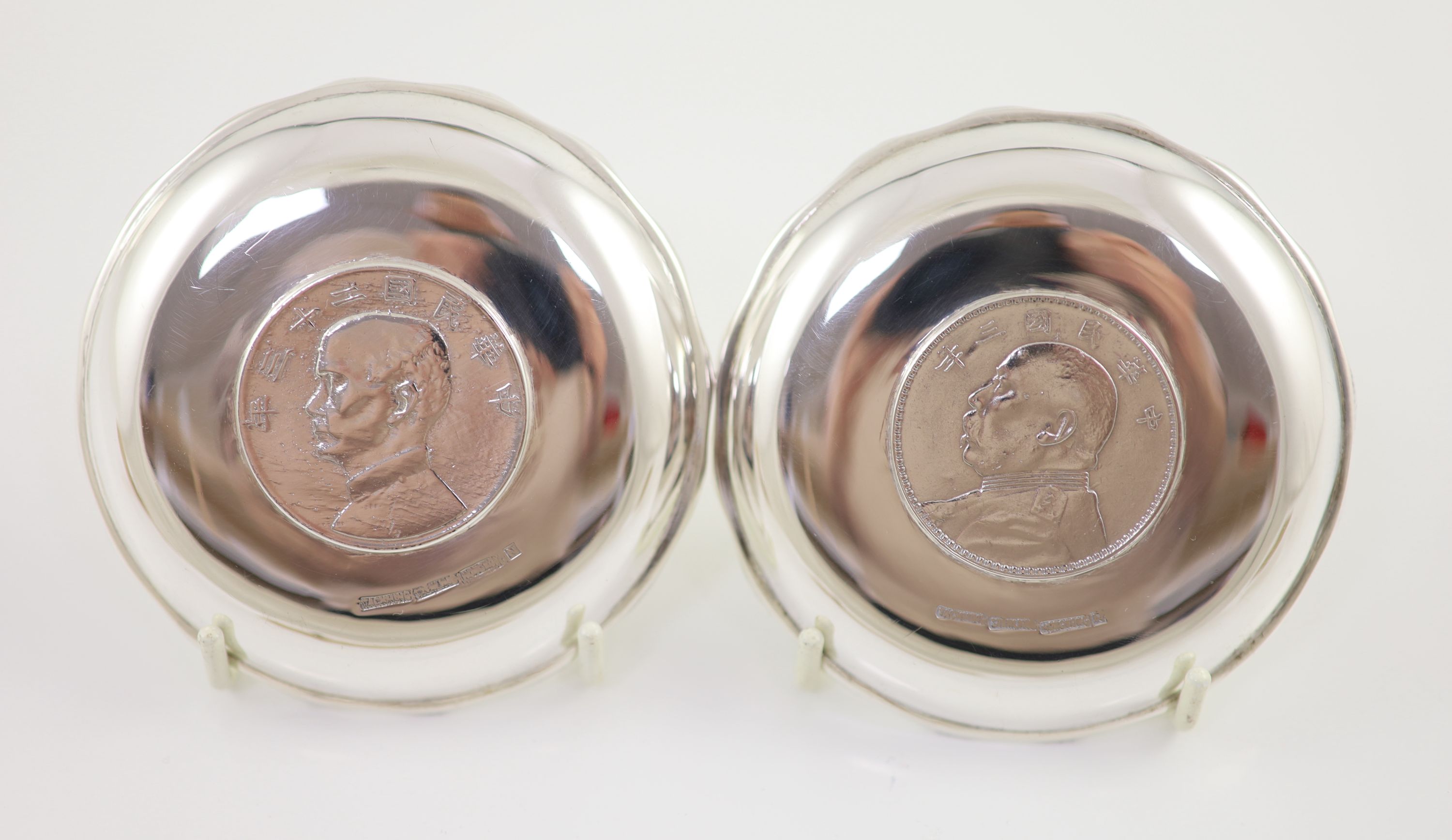 Ten early 20th century Chinese Export small Sterling silver coin inset dishes with shaped 'bamboo' edges, by Tach Hing, Hong Kong,